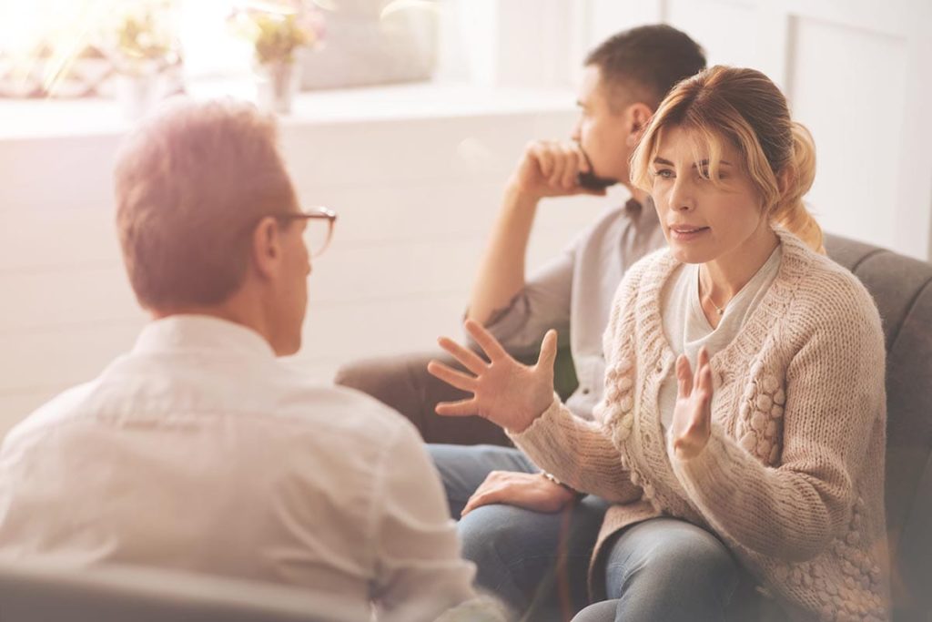 couple talking through what their should know about family therapy