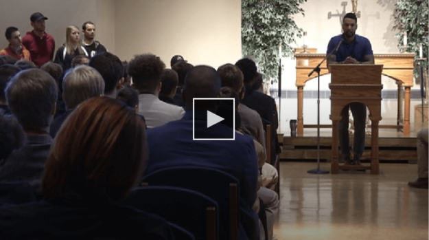 screen shot of a man giving a presentation