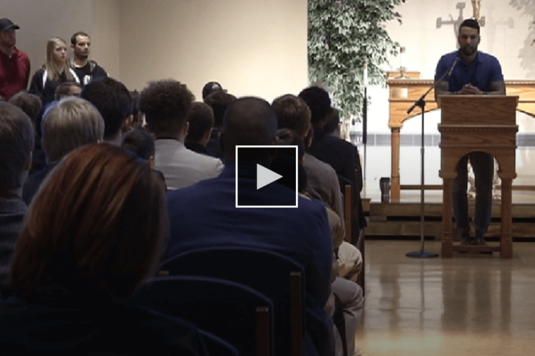 screen shot of a man giving a presentation