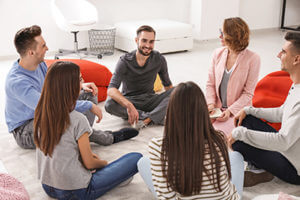 group therapy session on the floor during the Opioid Addiction Treatment Program