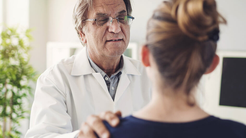 doctor speaking with woman about getting Addiction Help in ohio