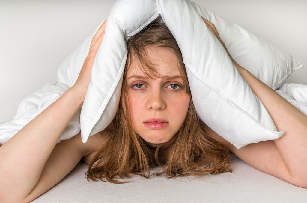 unhappy woman with opioid withdrawal symptoms