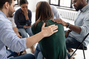 group comforting woman at the opiate detox center in ohio