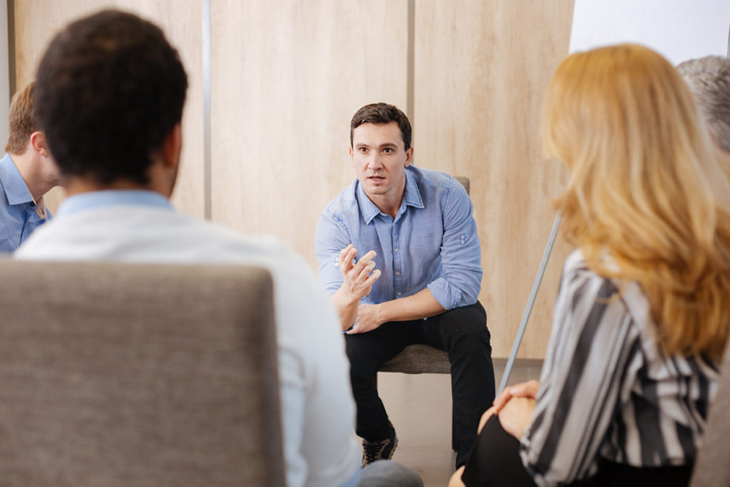 man talks to a group about the ways to prepare for Drug Detox