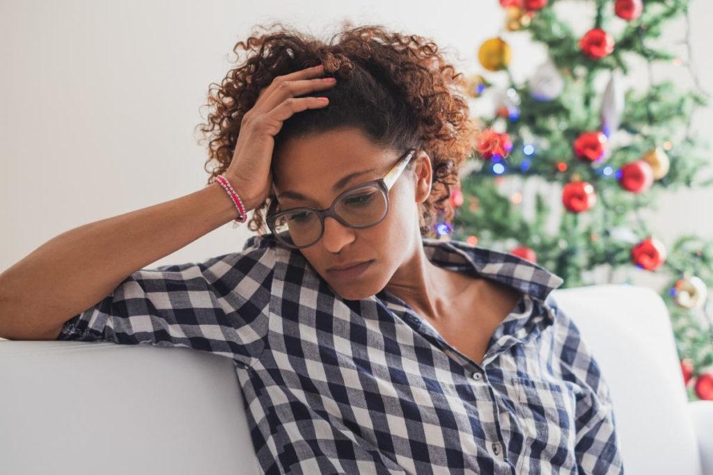 person dealing with holiday stress tips