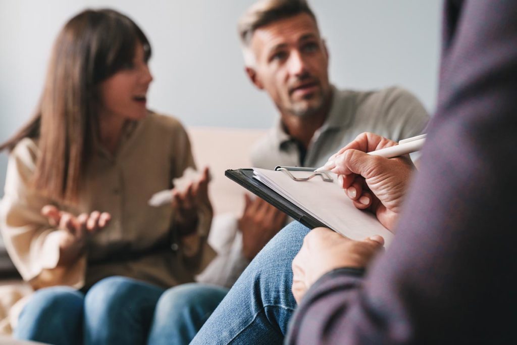 Couple participates in addiction family therapy