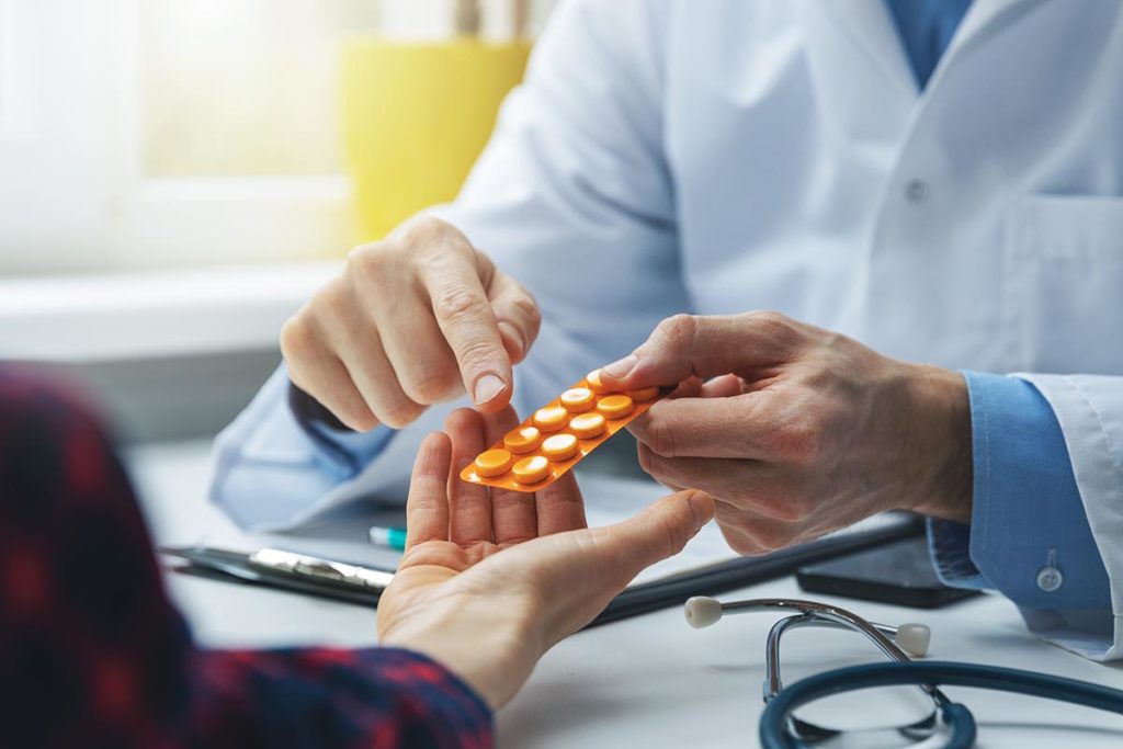 man learns about the benefits of medication assisted treatment
