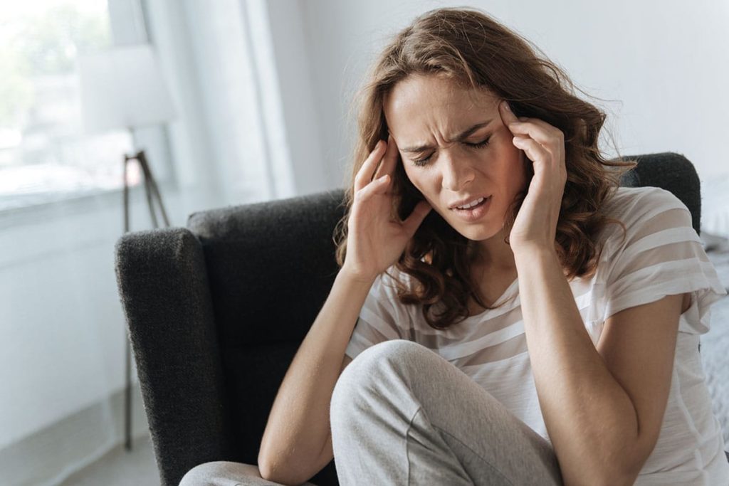 a woman suffering from the dangers of cocaine addiction