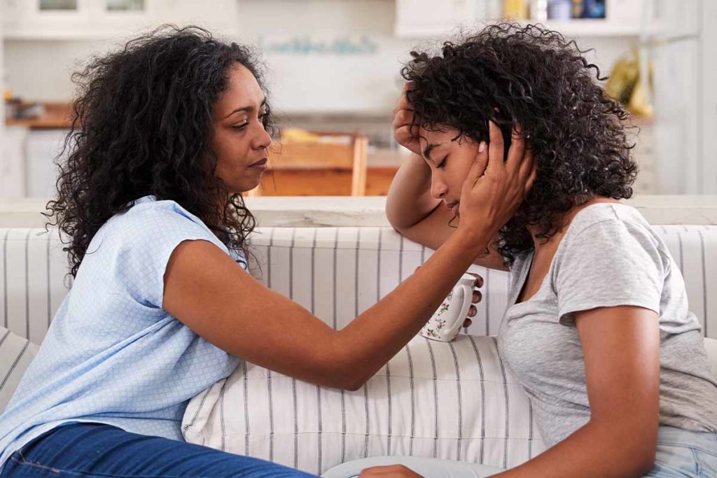woman considers if her daughter needs addiction rehab