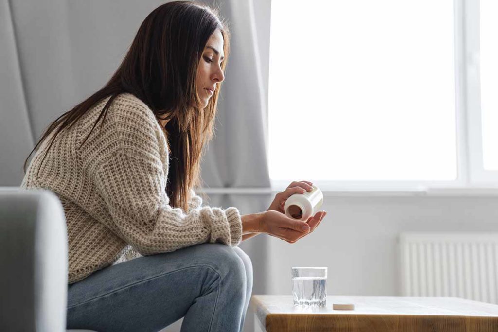 woman considers when painkiller addiction starts