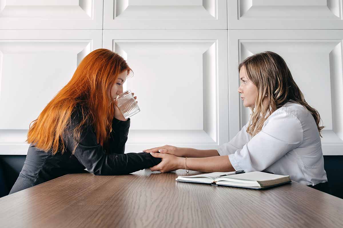 12-How-Behavior-Therapy-Assists-Addiction-Recovery woman gets behavior therapy for addiction