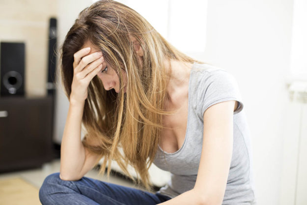 Earliest Signs of Prescription Drug Addiction woman deals with signs of prescription addiction