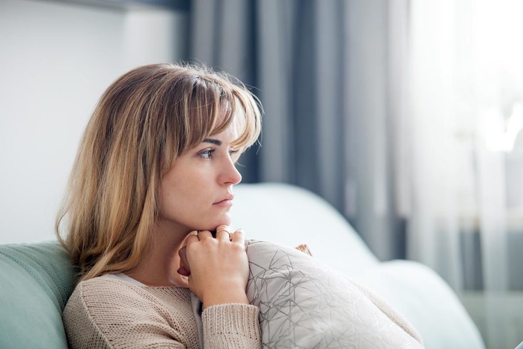 woman deals with alcohol withdrawal symptoms