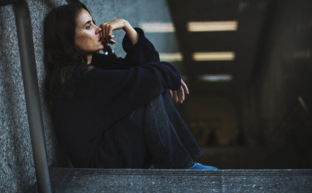 woman considers the side effects of drug detox