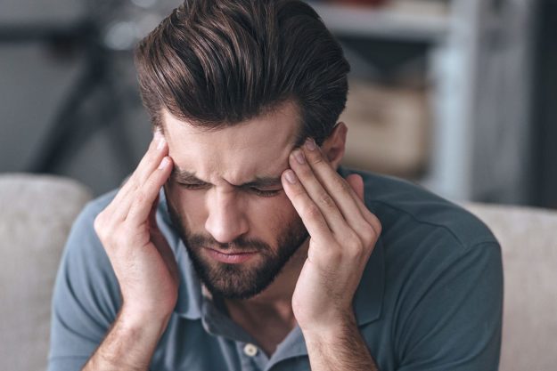 man struggles with xanax detox symptoms