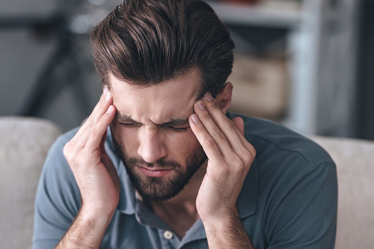 man struggles with xanax detox symptoms