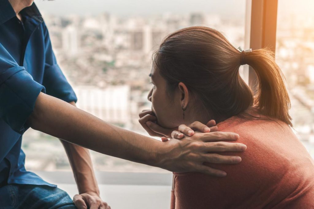 person being comforted at inpatient drug treatment centers