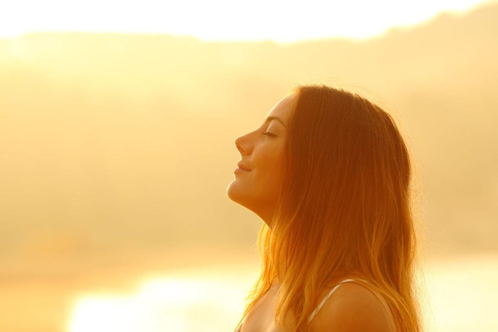 woman experiencing the health benefits of sobriety