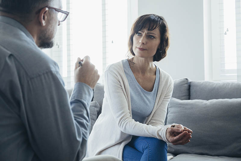 Psychologist appointment in a therapy room in office about alcohol detox