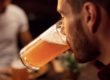 man drinking beer as sign of binge drinking